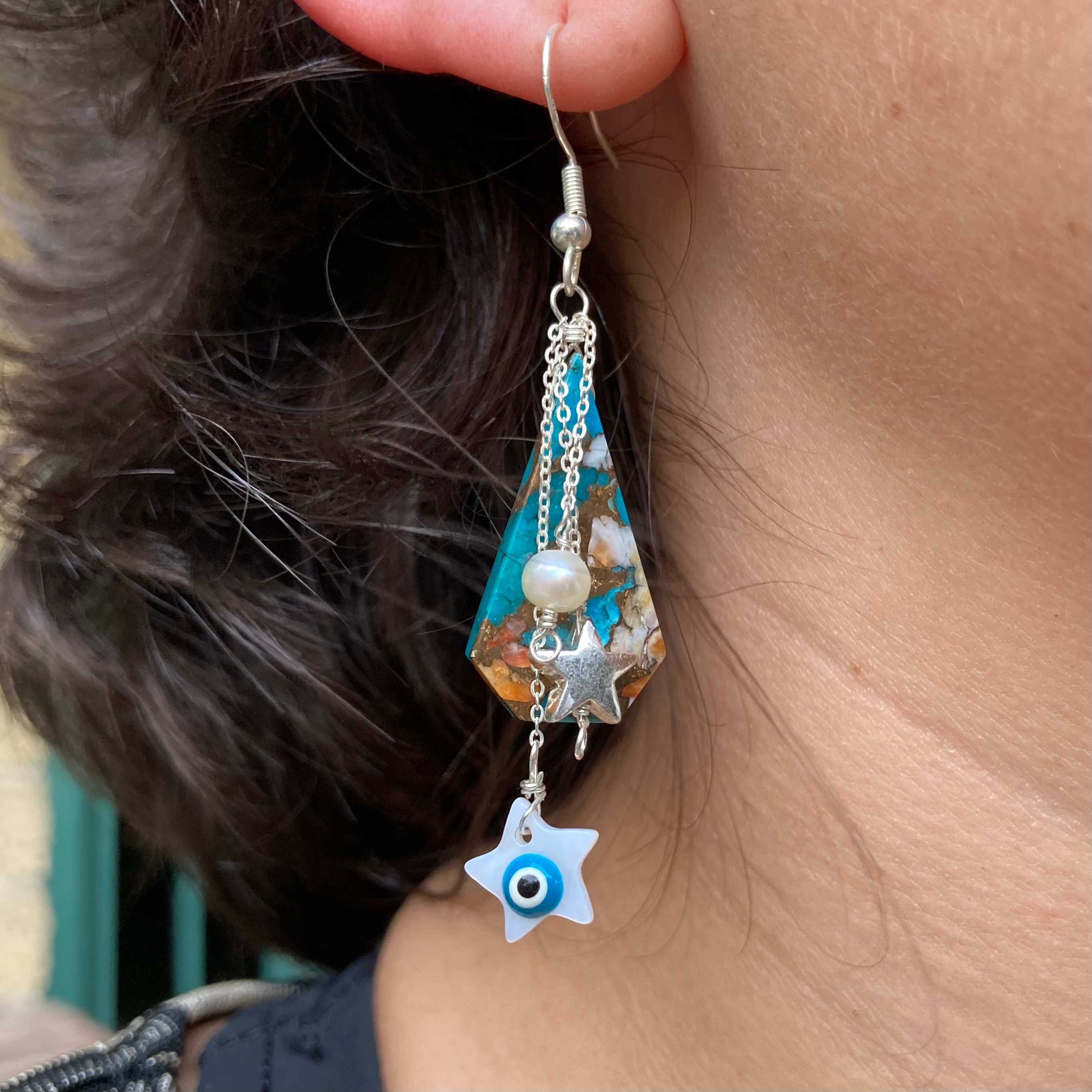 See Star Dangle Earrings image 0